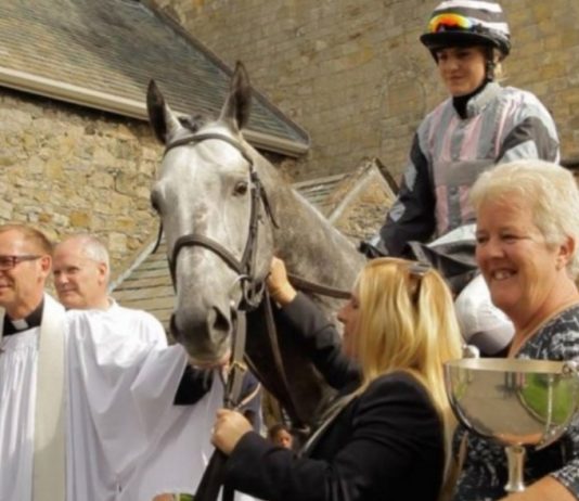 James Moffatt (left) with Cartmel Priory Reverend Nick Devenish at the blessing of the racehorse service.