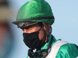 Jockeys: required to wear masks.