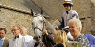 James Moffatt (left) with Cartmel Priory Reverend Nick Devenish at the blessing of the racehorse service.
