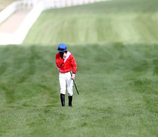 Kennedy as distraught as he made the long walk back to the jockeys room.