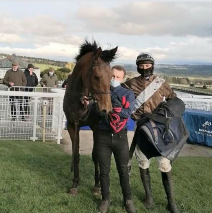 Tom Midgley in the winner's enclosure at Hexham after riding Tim Easterby trained Betty Baloo.